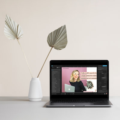 laptop scene with vase