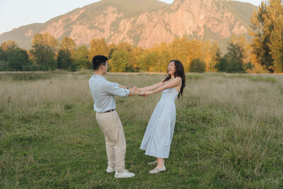 couple kissing in a lupine field