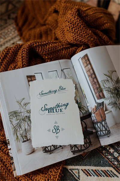 open magazine on blanket