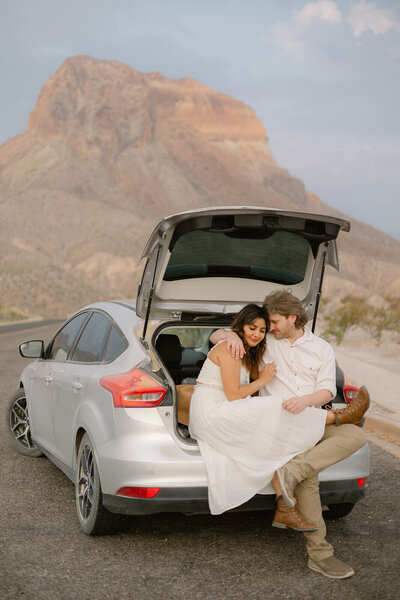 couple taking pictures in big bend to enjoy their travels