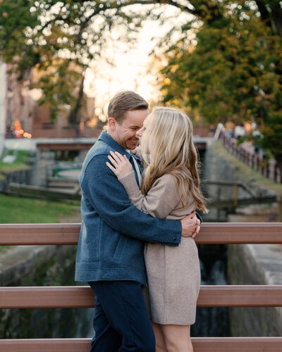 A couple standing close about to kiss