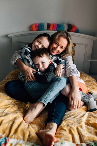 Black and white wedding image of couple, woman with eyes closed and head snuggled into man's shoulder. Couples photoshoot Melbourne, And So I Don't Forget Photography