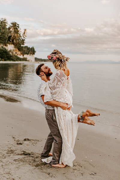 Bride and groom at their secluded, romantic Thormanby Island elopement in British Columbia. Florals by Gibson's Florist, Reclamation Design Society Boho Wedding Gown.