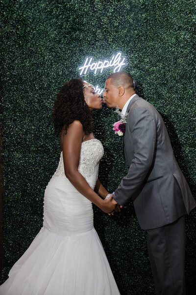 couple kissing at wedding vow renewal