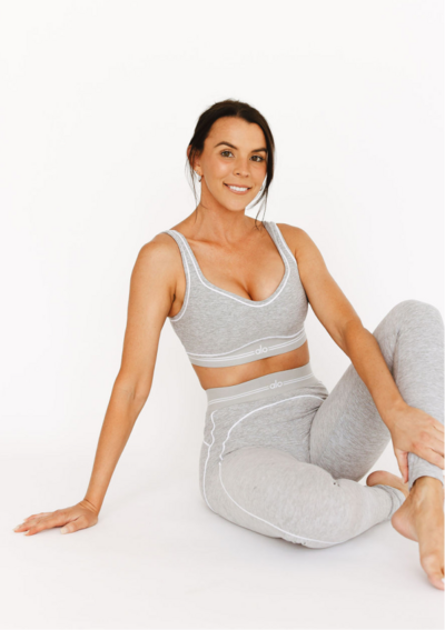 Picture of women after committing to her workouts consistently and getting into shape after having kids 