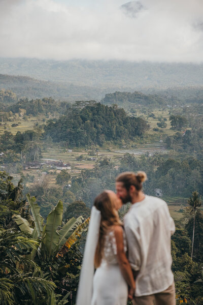 bride and groom in rainforest