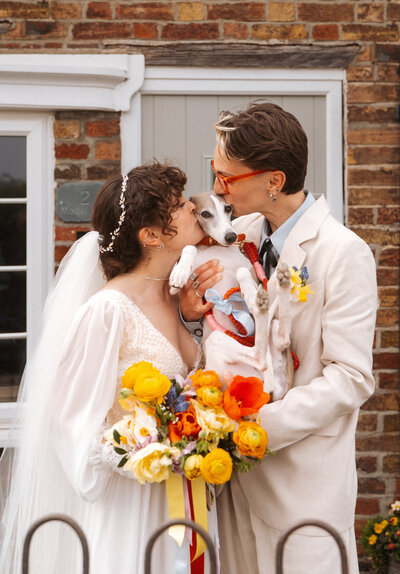 Bride and Groom have fun with their bridal party on their wedding day. Captured on film but fun wedding videographer, HC Visuals