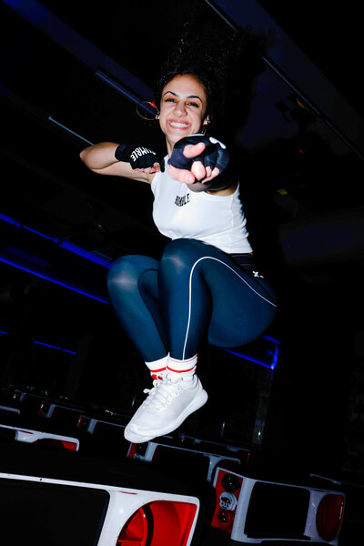Teresa jumps in the air at Rumble