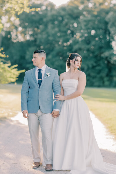 South Carolina Wedding Photographer | Bride and Groom looking opposite ways