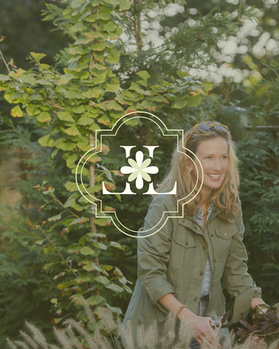 Hand-drawn monogram with floral flair that positions garden-focused brands as elevated, personal, and rooted in artistry.