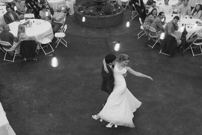 Birmingham intimate wedding photographer captures couple's dreamy first dance at their backyard wedding from the rooftop