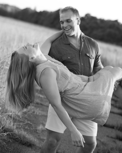shadow of couple touching foreheads on a sailboat 