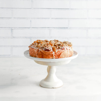Gourmet dessert styled on a white marble counter.