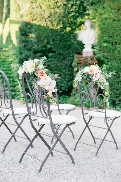 Wedding ceremony detail flower chairs