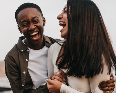 Couple laughing during California engagement photos - Colby and Valerie Photography