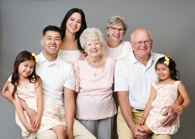 Extended family photos with grandparents in studio in Toronto, family portrait session