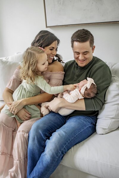 family of four with a new baby in Mckinney Texas