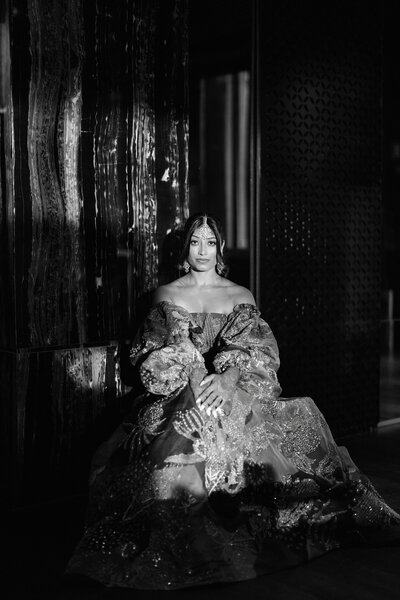 A stunning bride poses in a luxurious gown, representing the elegance of destination wedding planning. Ideal for luxury honeymoon planners and destination weddings with personalized, high-end services.
