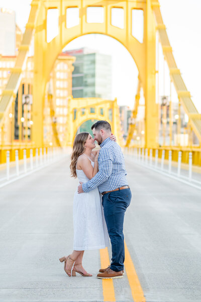 Pittsburgh couple on the Roberto Clemente Bridge during their engagement session