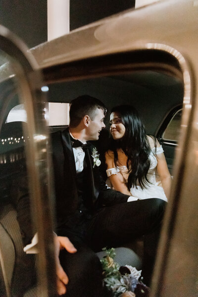 candid moment old vintage car bride and groom