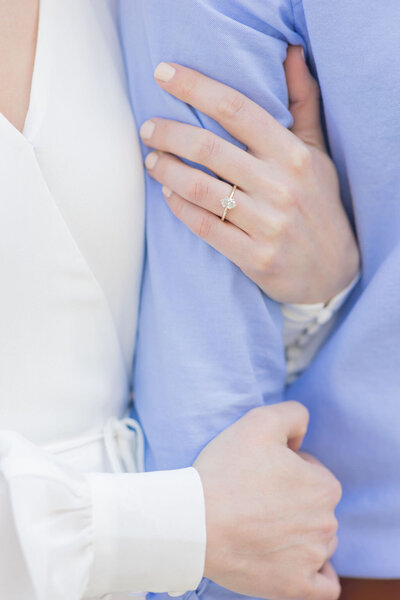 Couple stands outside in Carytown for an engagement