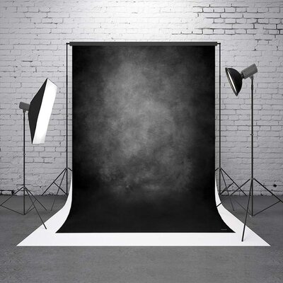 photo studio with 2 strobes and a black backdrop on a stand