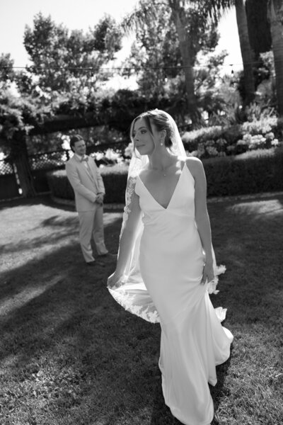 southern california wedding, bride walking away from groom, black and white wedding photo