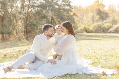 parents playing with baby