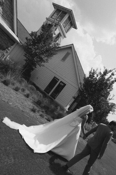 Birmingham documentary wedding photographer captures a couple with a beautiful veil in Anniston hills