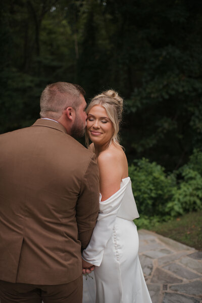 couple holding hands in the desert