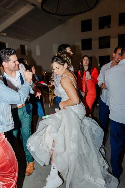 fun carter valley ranch wedding reception photos of bride dancing