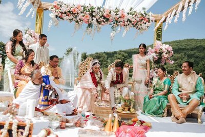 Bride and groom during their indian ceremony under a mandap in Mahwah New Jersey.