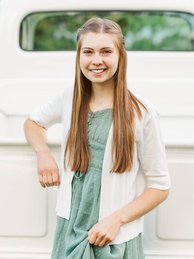 North East, PA, family portraits near Erie, PA, photographer leaning on a truck.