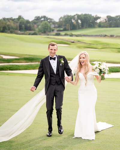 bride and groom celebrating wedding at oakmont country club pittsburgh church pews