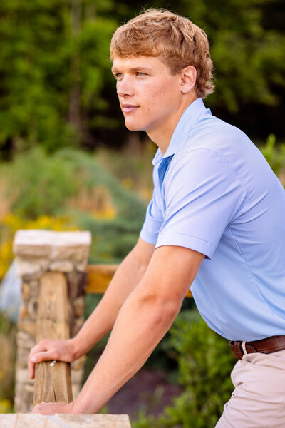a high school athlete poses in a dalton georgia photo session