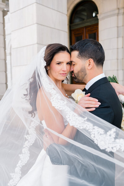 Newport Rhode Island Wedding Photographers | Rhode Island Caprio Captured Photography | Bride and Groom Kissing in front of RI State House