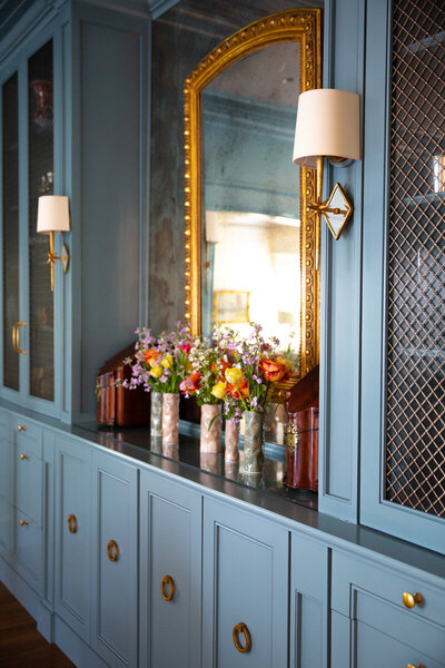 Image of dining room built-ins painted in dusty blue