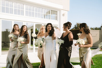 Bride holding dress