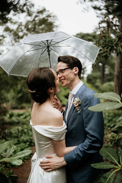 A close photography of a couple as they walk hand in hand down the aisle after their outdoors Glen Tanar wedding ceremony.