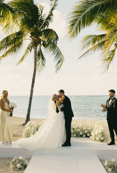 groom dipping bride