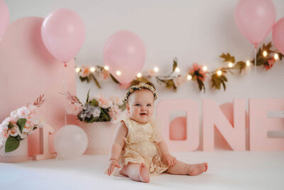Baby celebrates her first birthday with a Cake Smash Photoshoot in Asheville, NC.