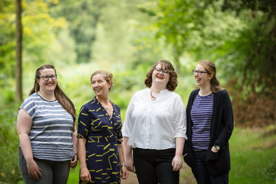 a group of women in forest of dean during family portrait session
