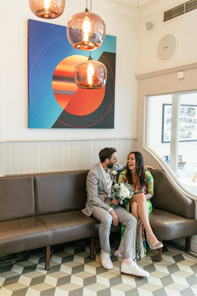 bride and groom during elopement ceremony in pub in London