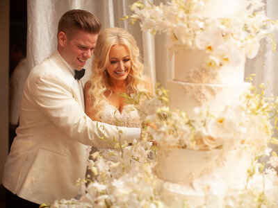 Bride and groom cake cutting