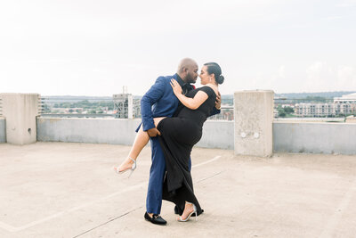 bride and groom almost kissing each other during their session at the River Market Parking deck in Little Rock Arkansas