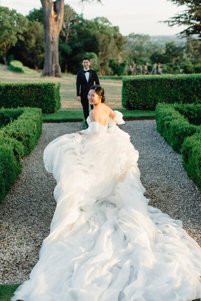 Bride and groom walk up memorial steps at their DC wedding