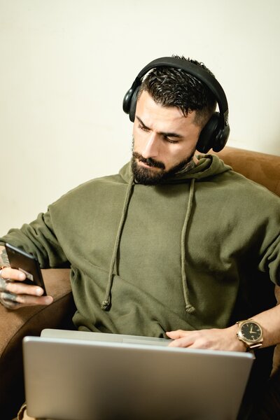 man listening to podcast