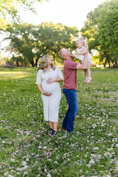 growing family takes pictures together with st george maternity photographer