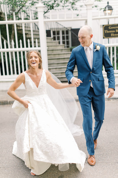 Bride and groom kiss at the bottom steps of Nella Terra Cellars at their Livermore wedding