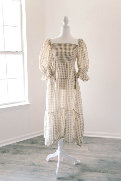 Women's white gingham pattern dress.